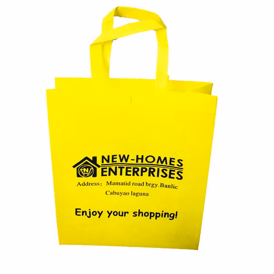 Impression promotionnelle personnalisée en gros PP Non tissé sac d'emballage de magasinage Eco T-shirt sac fourre-tout réutilisable